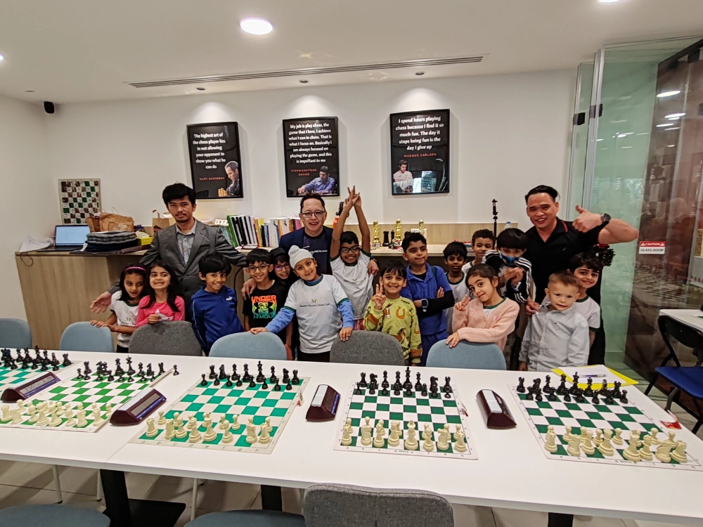 Young chess prodigy concentrating